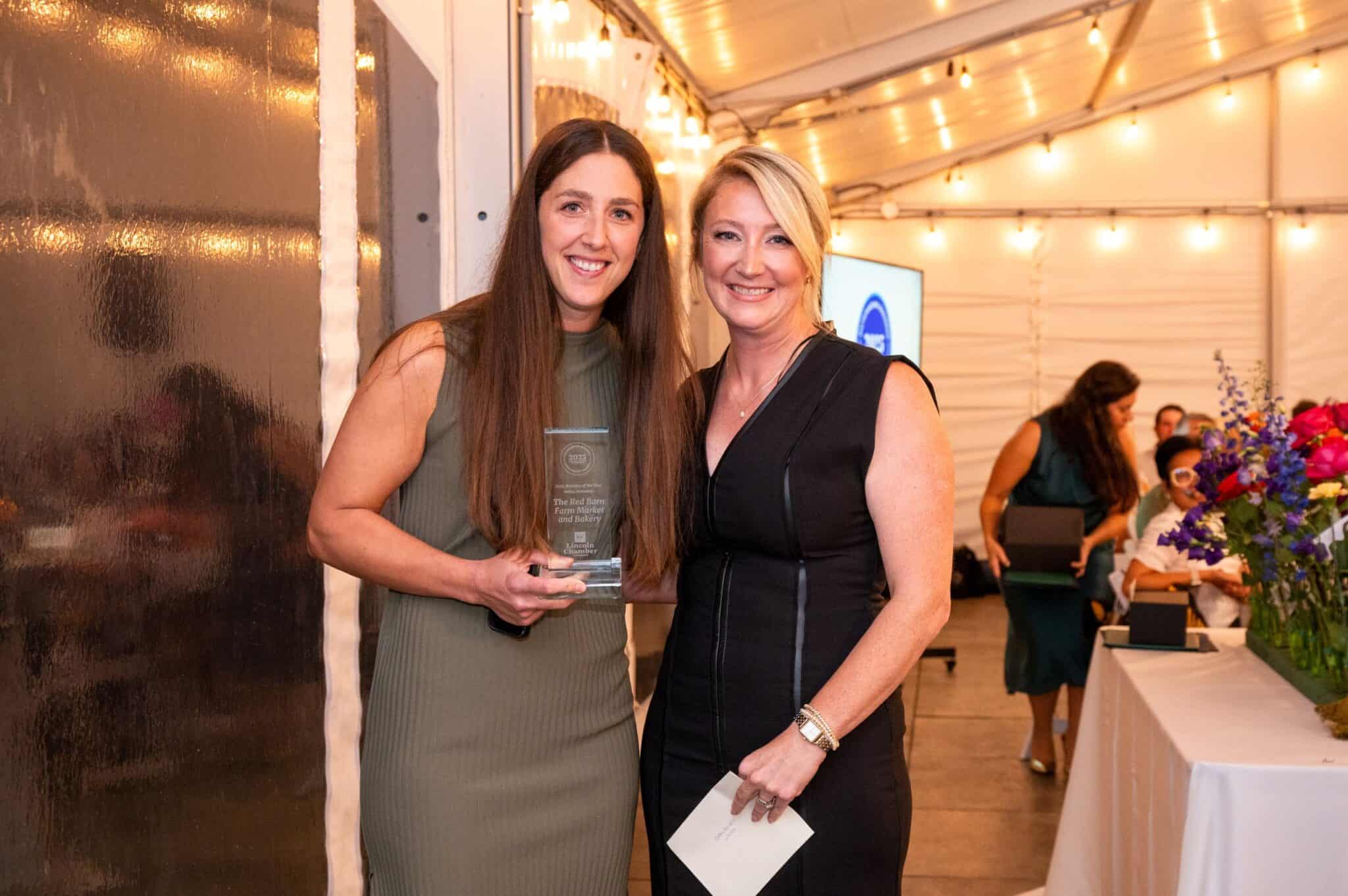 Julia, owner of the red barn posing with the award sponsor/presenter, Jen, from Crush on Niagara Wine Tours