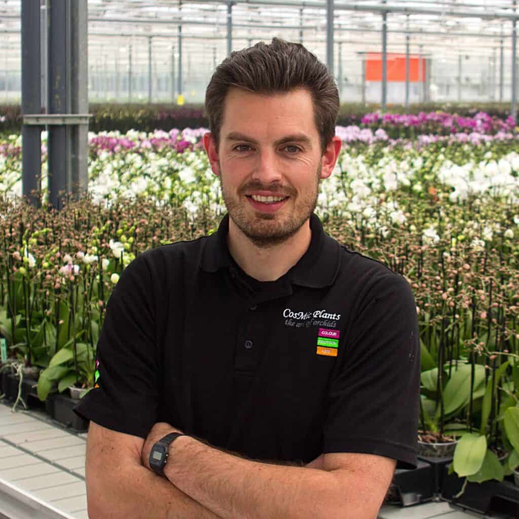 Professional headshot of Arjan in the CosMic Plants facility