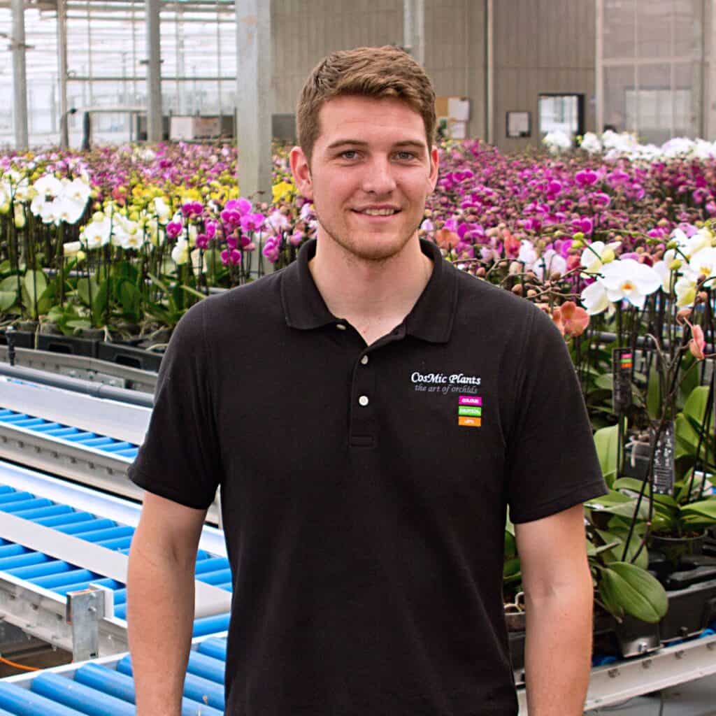 Professional headshot of Connor in the CosMic Plants facility