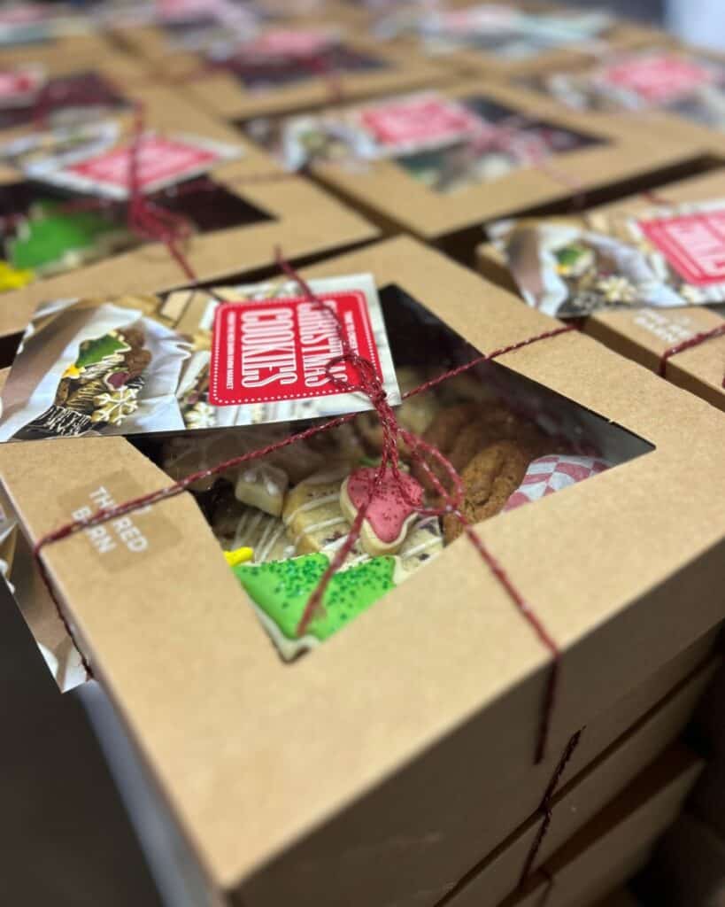 Close up of a packaged box of Christmas cookies ready for pick up